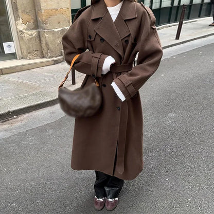 Women's oversized double-breasted trench coat with waist belt and notched collar – 7